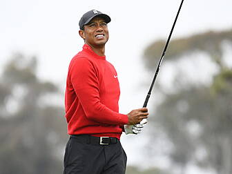 Tiger Woods and caddie sued by...